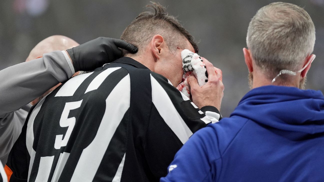 Referee Rooney leaves Game 7 after stick to face