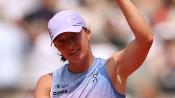 Swiatek vs Sabalenka: French Open Semifinal Preview Iga Swiatek in action at Roland Garros