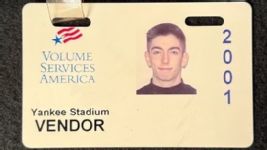 neil dunleavy holding the derek Jeter 'Mr. november' home run ball.