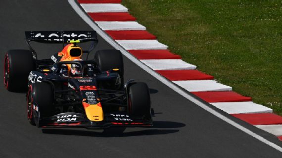 Canadian GP: Tsunoda Grid Penalty - 10 Places Yuki Tsunoda in his red Bull car on the track.