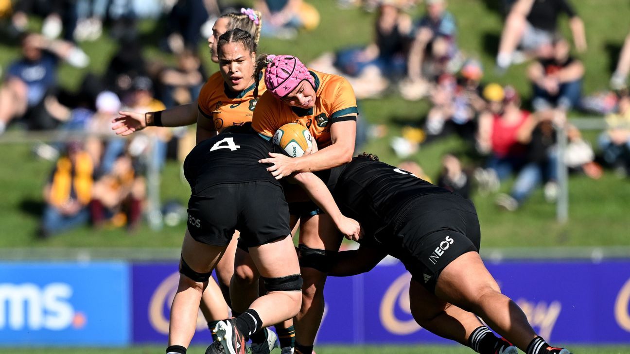 Piper Duck of the Wallaroos is tackled