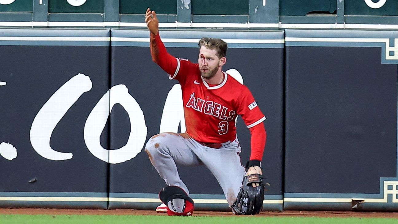 Angels' Ward crashes into scoreboard, carted off