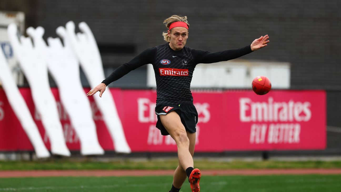 Collingwood captain Darcy Moore on the sidelines