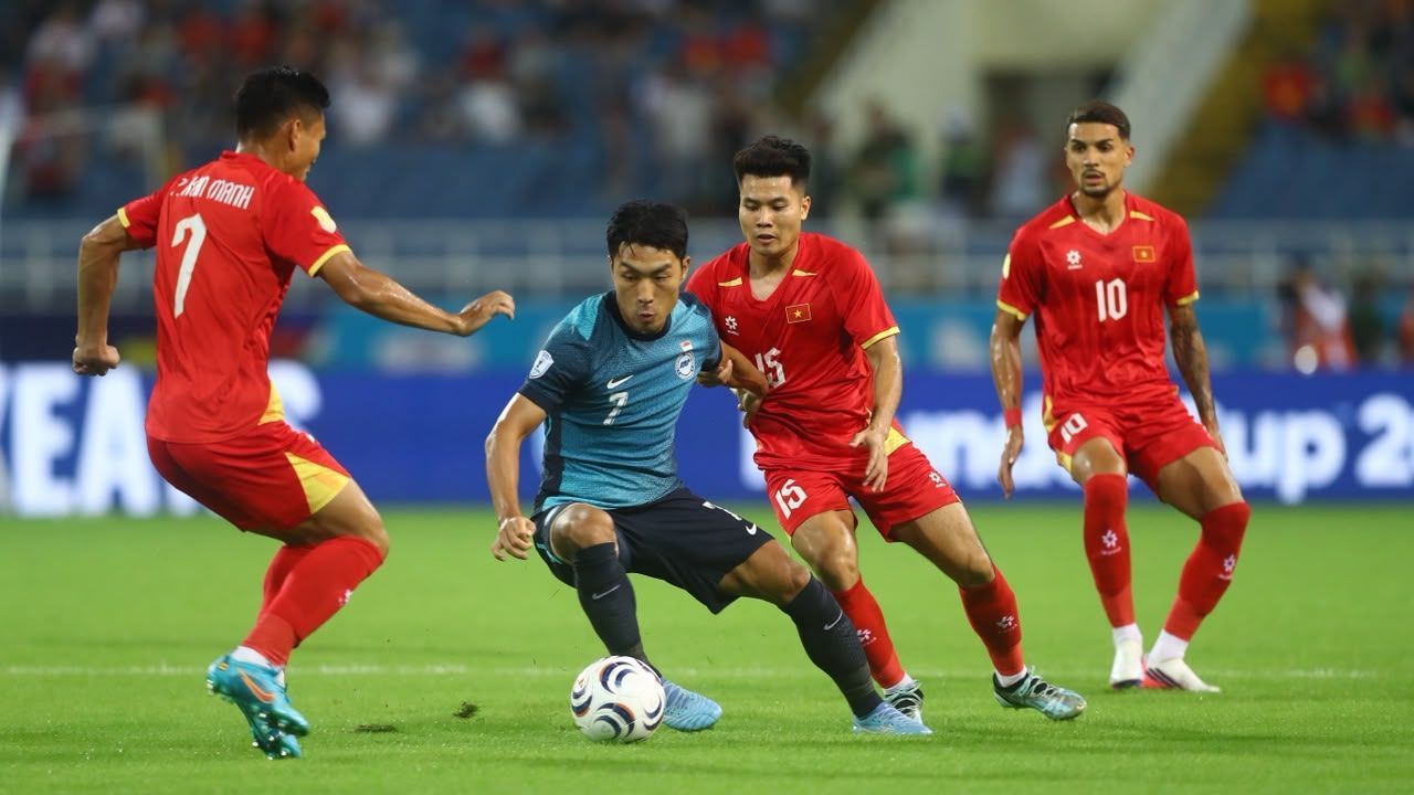 Singapore grind out draw in Vietnam to stay top of Group A in ASEAN Championship