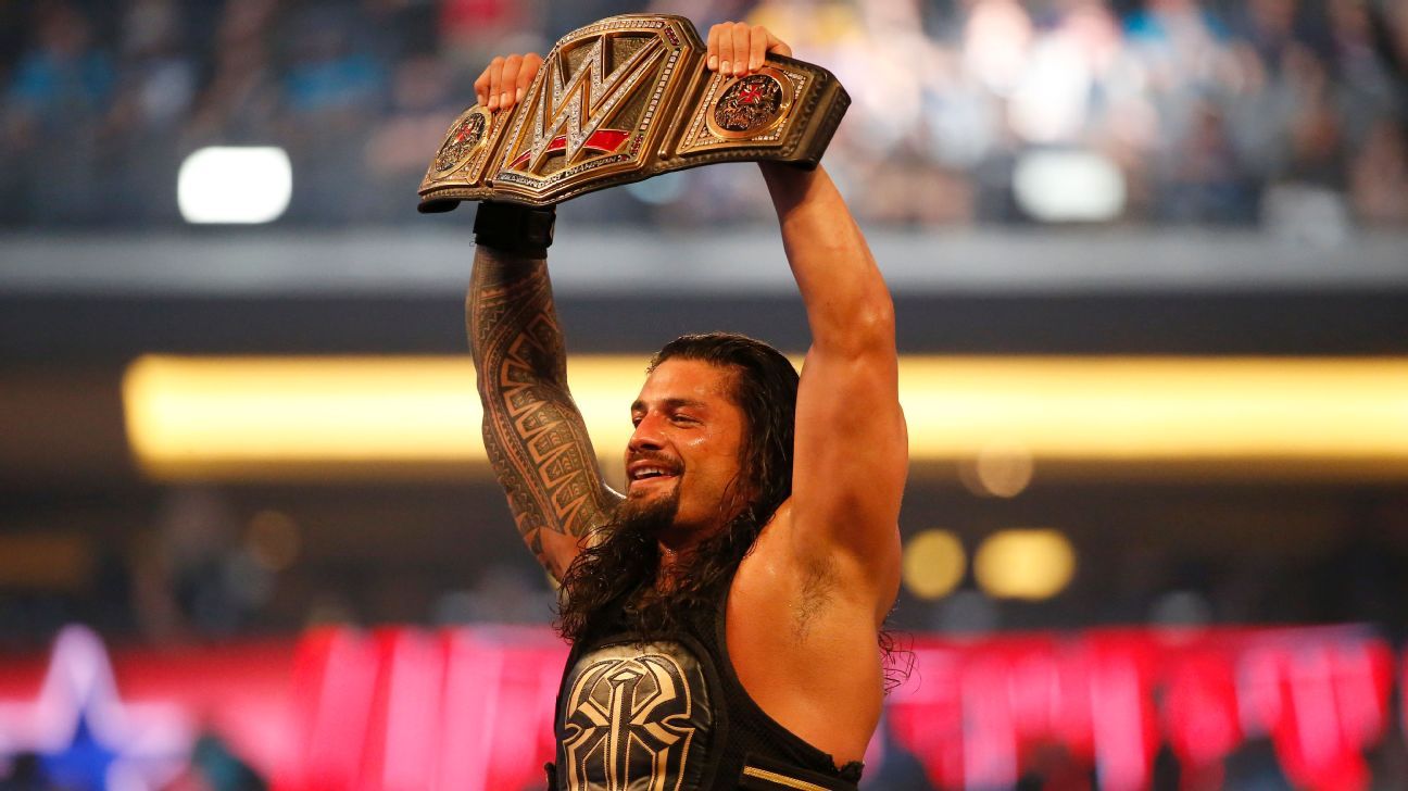 Who holds the record for the most WWE world titles and longest reigns?