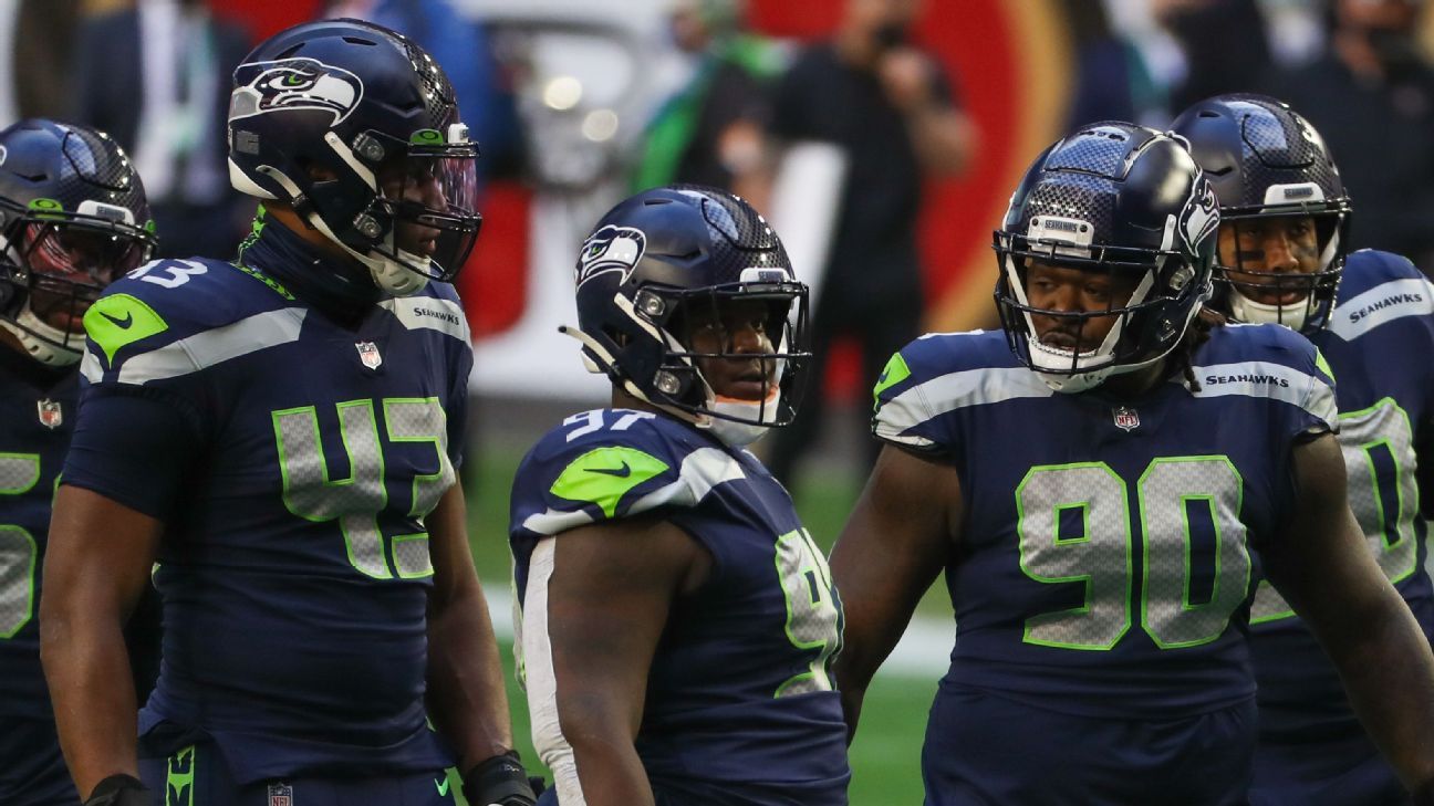 Seattle Seahawks re-sign Carlos Dunlap;  Jarran Reed expected to be released or traded